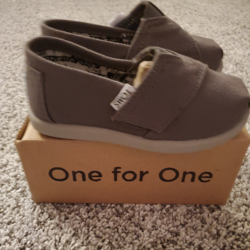Brand new Toms